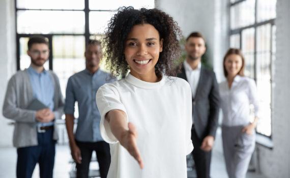 Head,Shot,Portrait,Smiling,African,American,Businesswoman,Offering,Handshake,,Standing